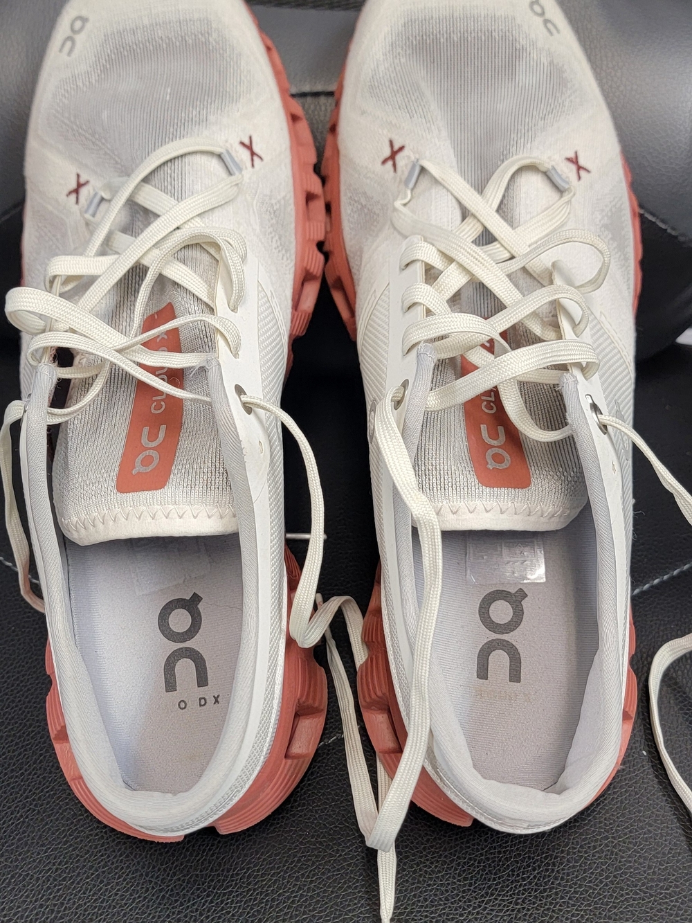 On Running Cloud Women’s Running Shoes in White with Coral Outsole